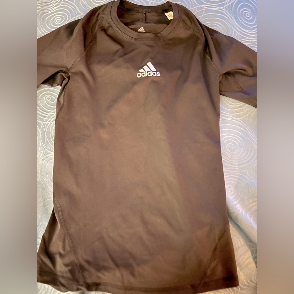 Brand new Adidas weather tech under shirt.